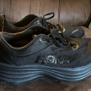 Woman’s black Hoka One One Bondi 8